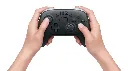 123674-nintendo-switch-2-pro-controller-with-hands-1200x675_copy.webp